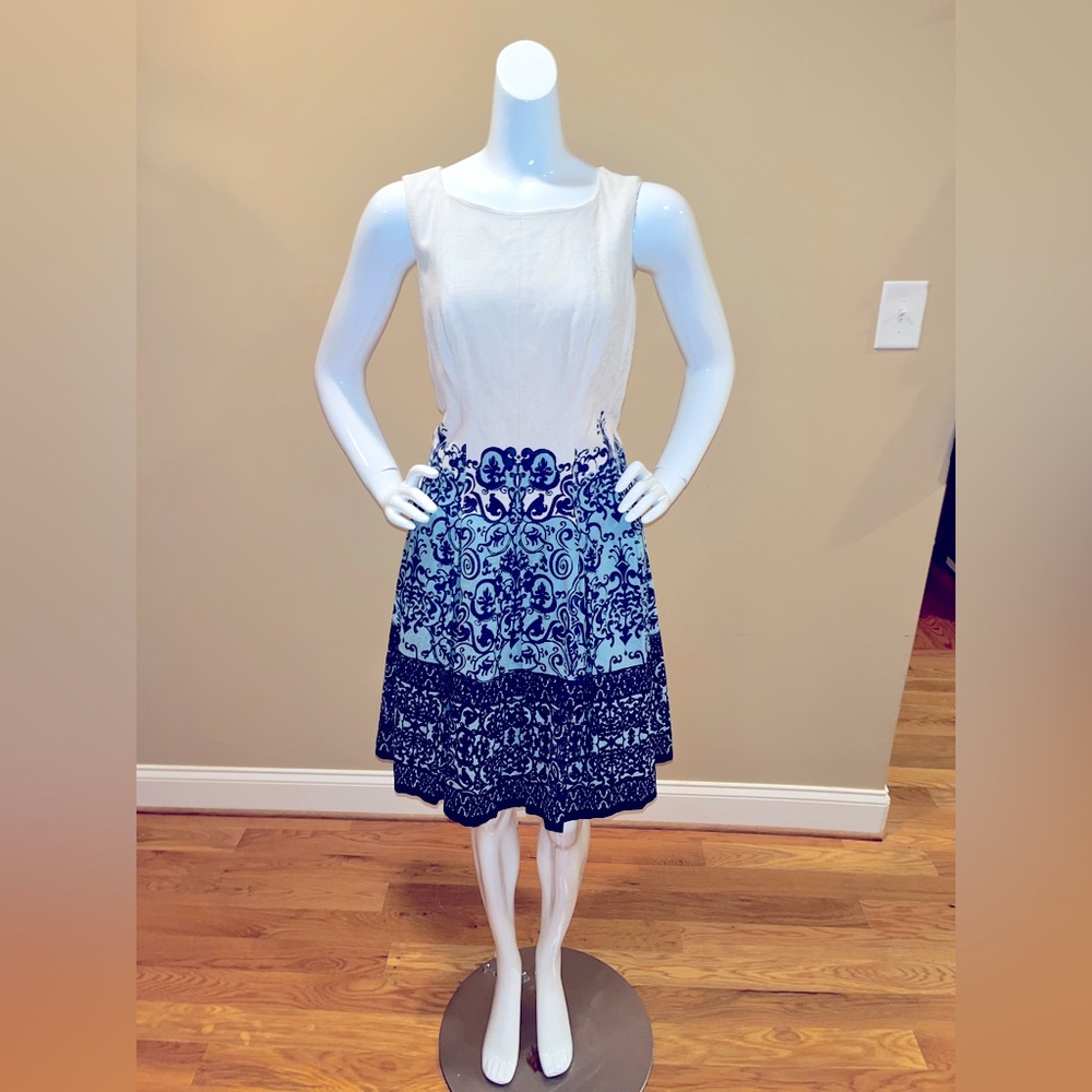 Just the cutest sundress. Lined full skirt and detailed bodice.